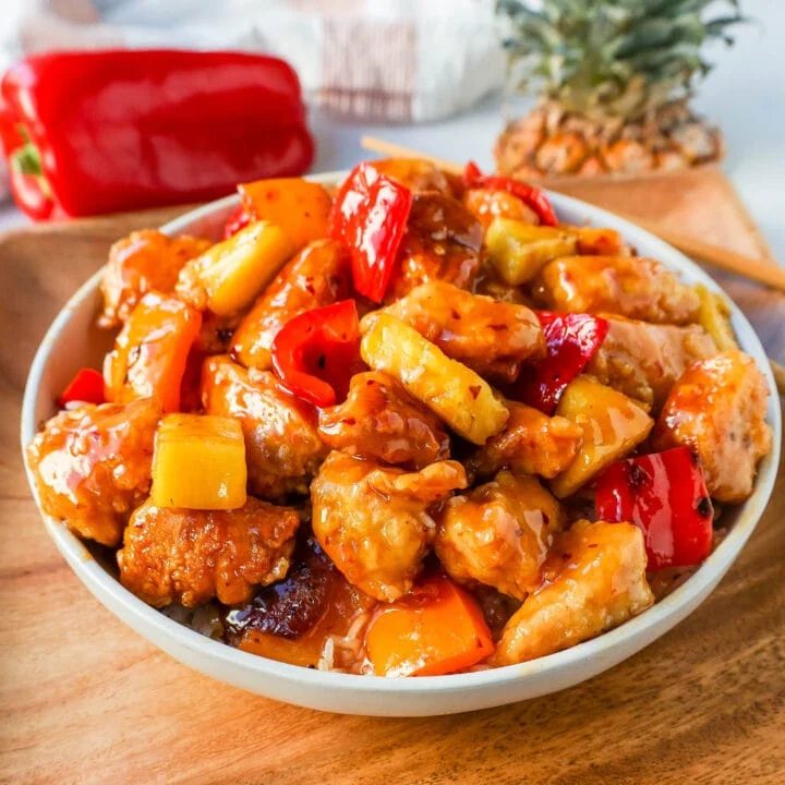 Sweet and Sour Chicken is made with crispy fried chicken covered in a pineapple sweet and sour sauce. The ultimate Sweet and Sour Chicken Recipe is way better than take-out.