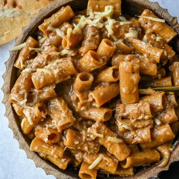 This One Pot French Onion Pasta takes everything you love about French onion soup and turns it into a creamy and cheesy pasta dish. This popular dinner recipe on TikTok is made in just one pot, with caramelized onions, garlic, thyme, and pasta simmered in a savory creamy broth, then topped with Gruyère and Parmesan cheese.