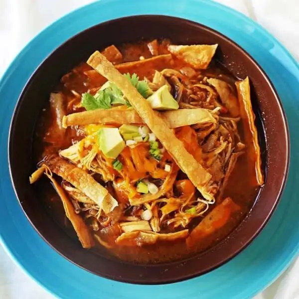 Chicken Tortilla Soup. The Best Homemade Chicken Tortilla Soup Recipe. Flavorful, easy chicken soup recipe. www.modernhoney.com #chickentortillasoup #tortillasoup #chickentortillasouprecipe