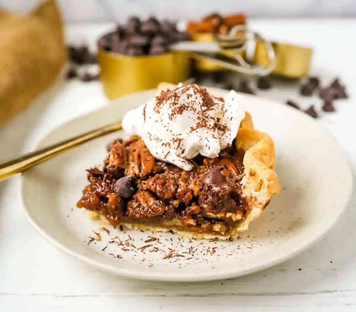 Chocolate Pecan Pie Rich chocolate pecan pie made with a brown sugar filling, crunchy pecans, rich chocolate, all in a homemade buttery, flaky pie crust. www.modernhoney.com #pie #pecanpie #chocolatepecanpie #thanksgiving #pies