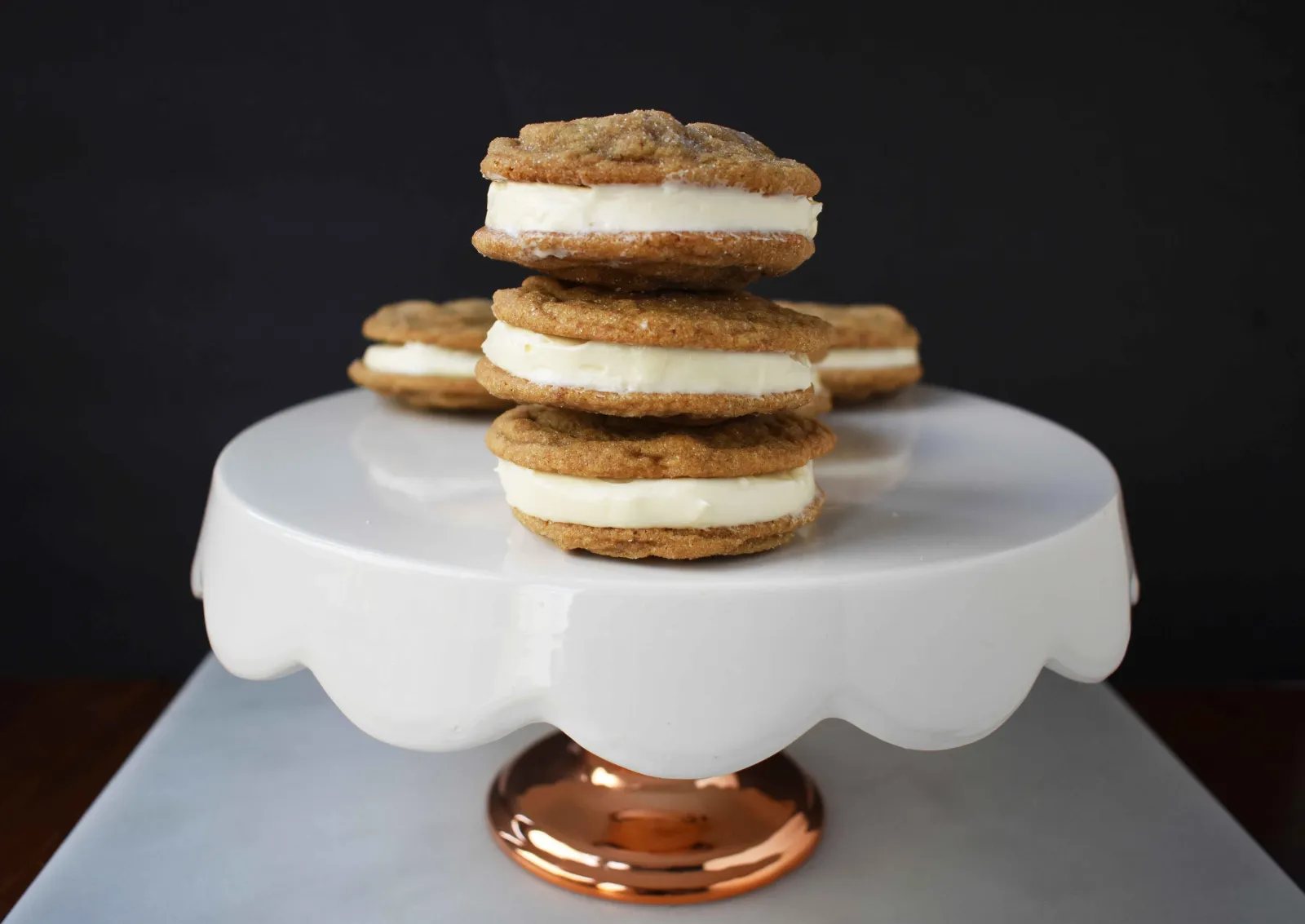 Gingersnap Oreos with Cream Cheese Filling. Soft Gingerbread Cookies filled with sweet cream cheese filling. A favorite holiday cookie!