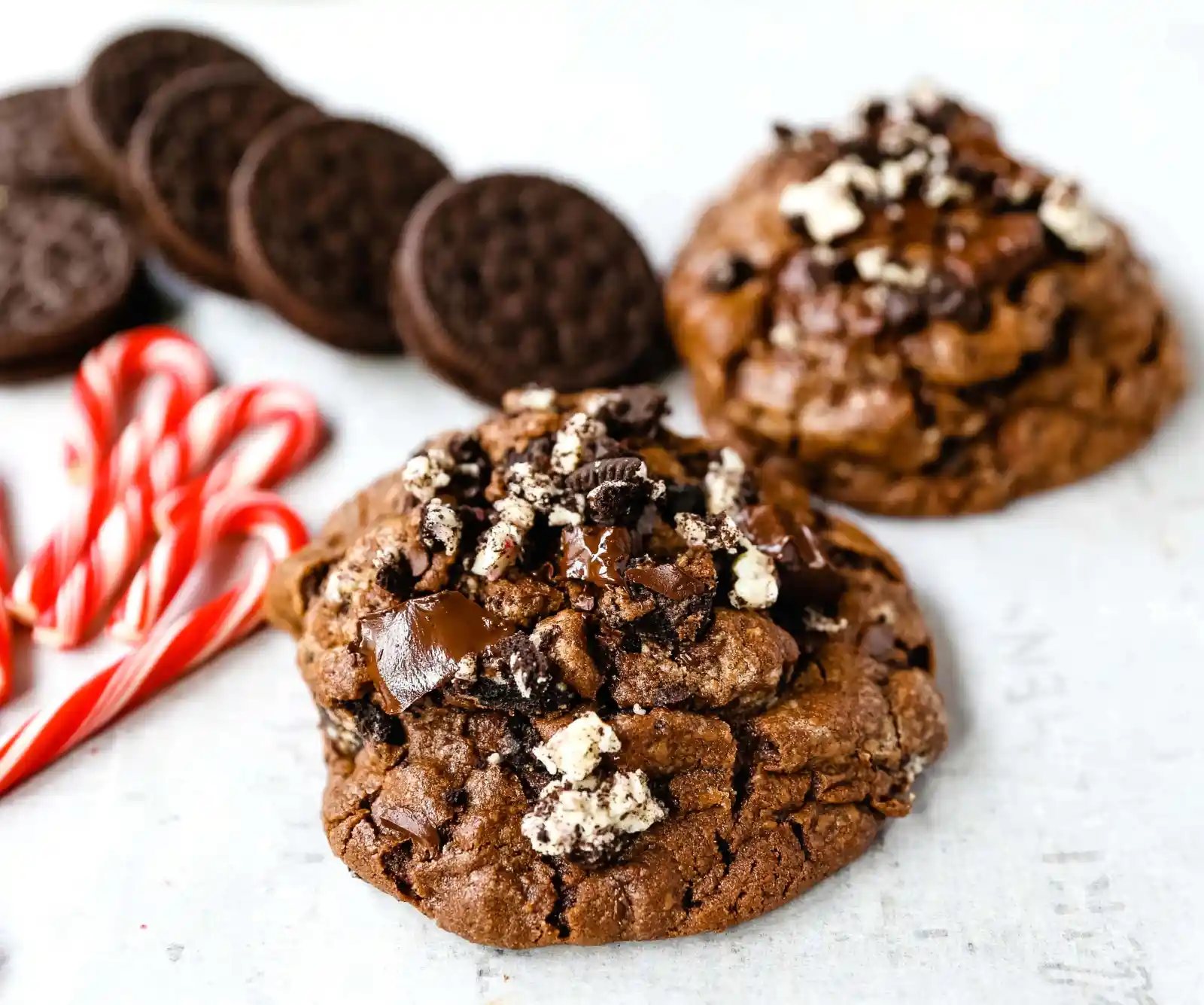 Chocolate Peppermint Candy Cane Oreo Cookies. The best chocolate peppermint cookies. Double chocolate cookies with Trader Joe's famous candy cane Joe Joe's Oreo cookies. www.modernhoney.com #chocolatecookies #chocolatepeppermint #chocolatemint #christmas #christmascookies #candycanes