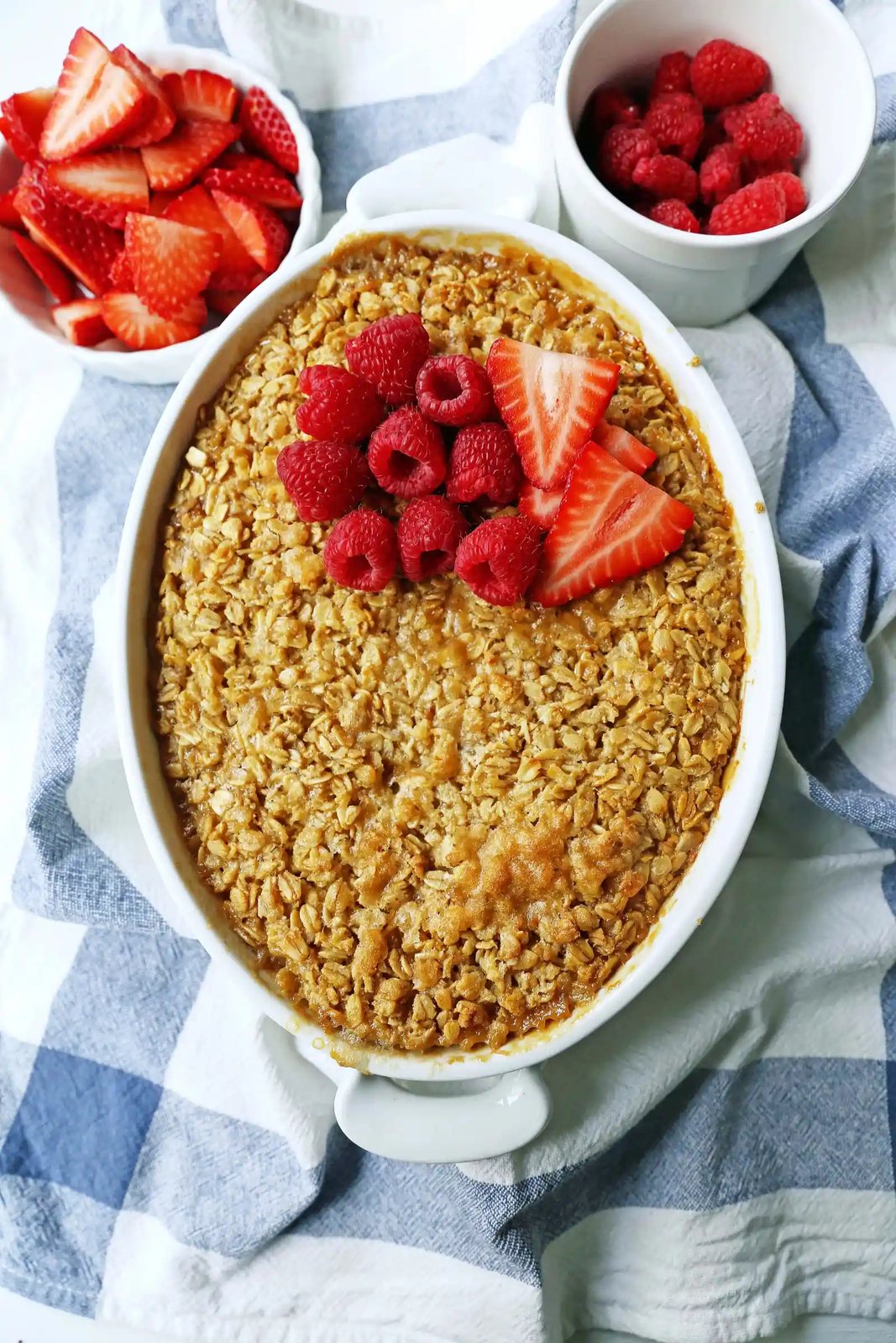 Baked Oatmeal. Brown Sugar Baked Oatmeal. A warm, comfort food breakfast is a perfect way to serve a crowd or to re-heat for those busy mornings. www.modernhoney.com #bakedoatmeal #oatmeal #oatmealbake #brownsugaroatmeal