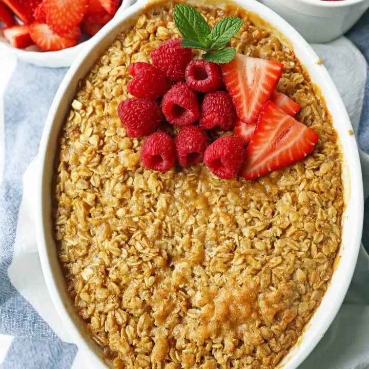 Baked Oatmeal. Brown Sugar Baked Oatmeal. A warm, comfort food breakfast is a perfect way to serve a crowd or to re-heat for those busy mornings. www.modernhoney.com #bakedoatmeal #oatmeal #oatmealbake #brownsugaroatmeal