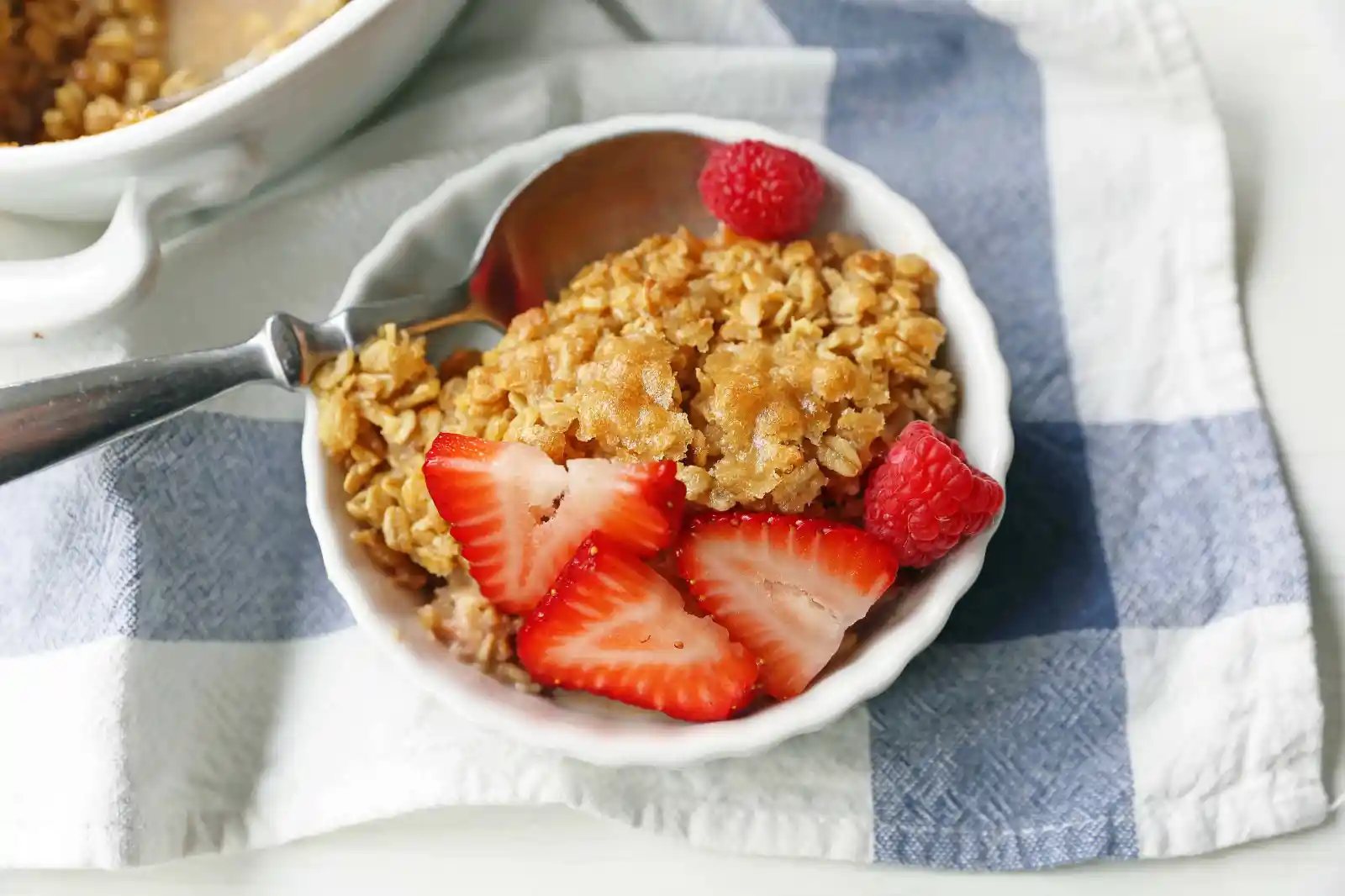 Baked Oatmeal. Brown Sugar Baked Oatmeal. A warm, comfort food breakfast is a perfect way to serve a crowd or to re-heat for those busy mornings. www.modernhoney.com #bakedoatmeal #oatmeal #oatmealbake #brownsugaroatmeal
