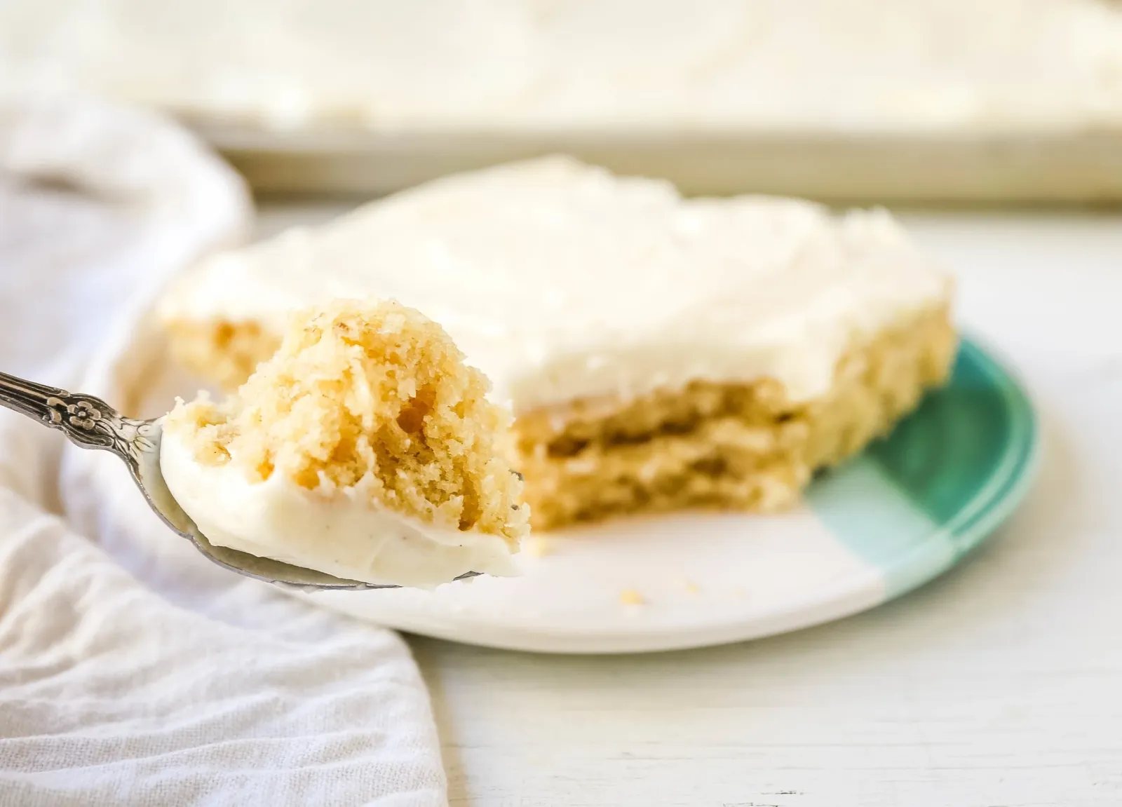 Banana Sheet Cake with Brown Butter Frosting Moist banana bars with a brown butter cream cheese buttercream. An easy frosted banana cake recipe! www.modernhoney.com #bananacake #bananabars #frostedbananacake #frostedbananabars #bananarecipes