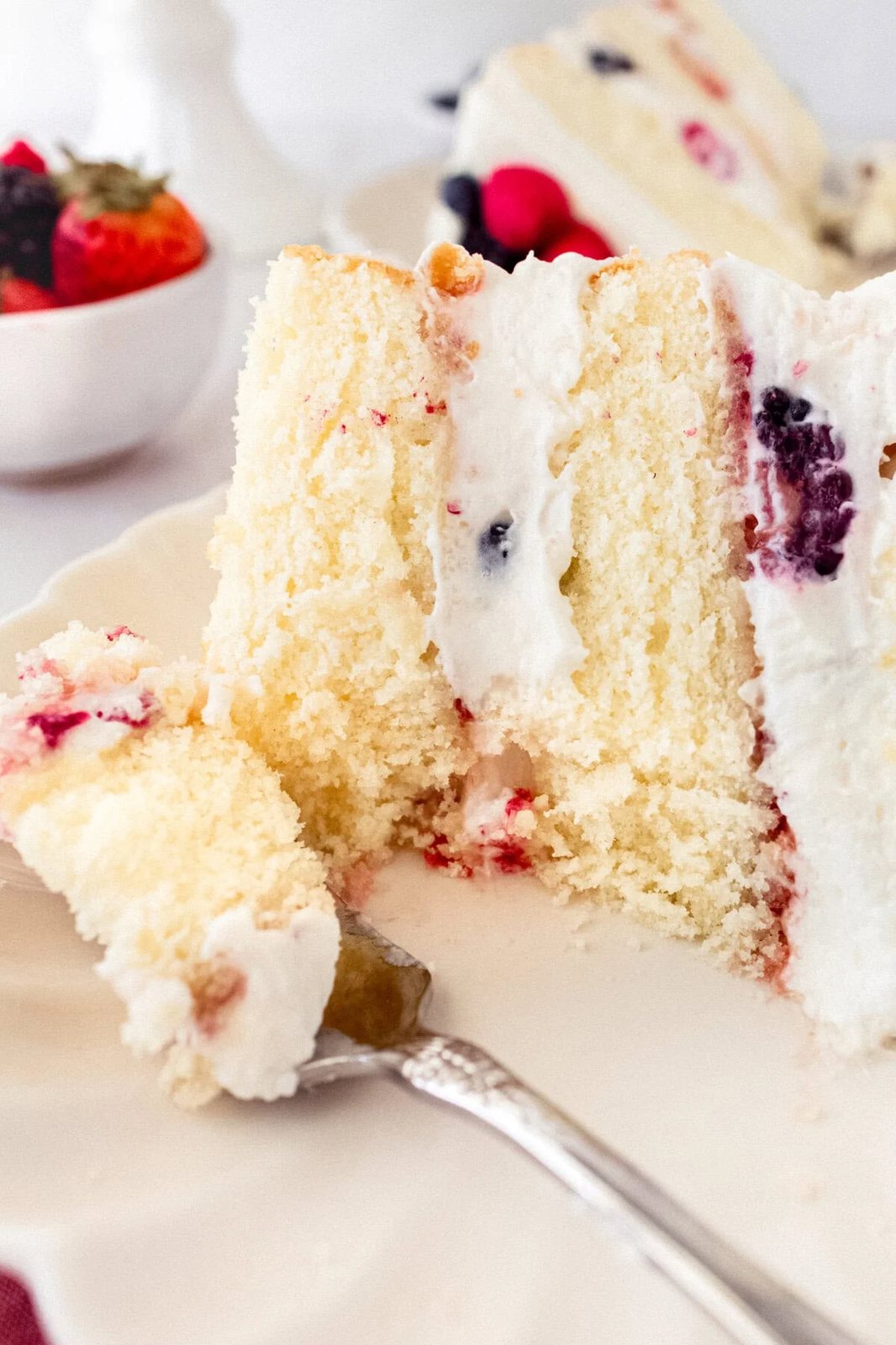 Chantilly Cake Recipe. Homemade moist yellow cake layered with fluffy sweet cream cheese whipped cream frosting and fresh berries. This Chantilly Cake is famous at Whole Foods and here's my copycat version so you can make it at home. This is the best Chantilly Cake recipe!