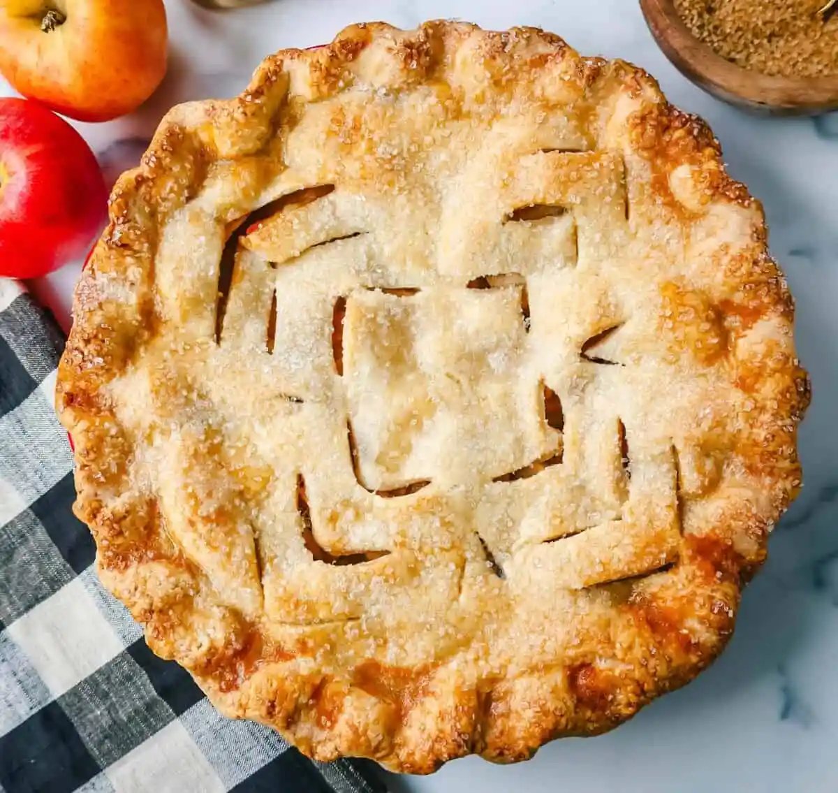 The Best Homemade Apple Pie Recipe! This Fresh Apple Pie with a Buttery, Flaky Crust is made with fresh apples tossed in sugar and cinnamon and baked in a homemade pie crust.