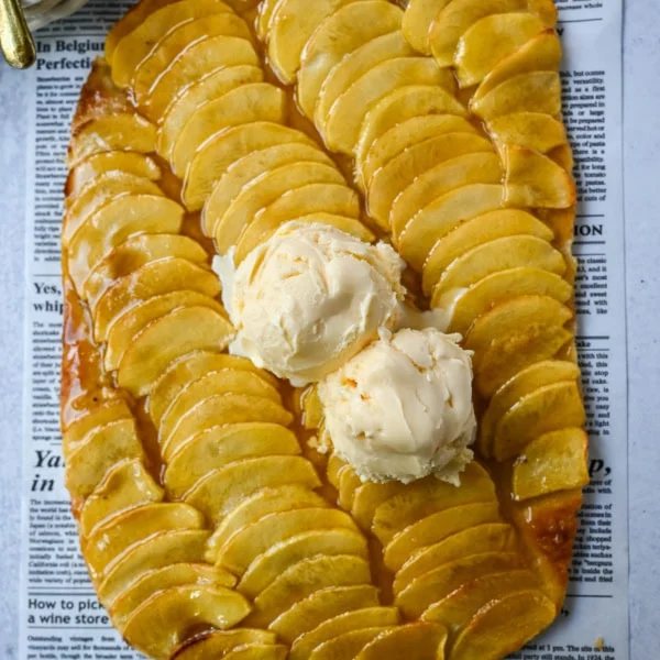 This homemade French Apple Tart recipe features a buttery crust, thinly sliced Granny Smith apples, and a golden apricot glaze for a bakery-style dessert. This Ina Garten French Apple Tart recipe is the best apple tart recipe, perfect for entertaining, holidays or any Fall baking.