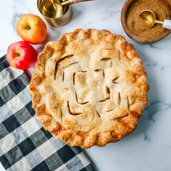 The Best Homemade Apple Pie Recipe! This Fresh Apple Pie with a Buttery, Flaky Crust is made with fresh apples tossed in sugar and cinnamon and baked in a homemade pie crust.
