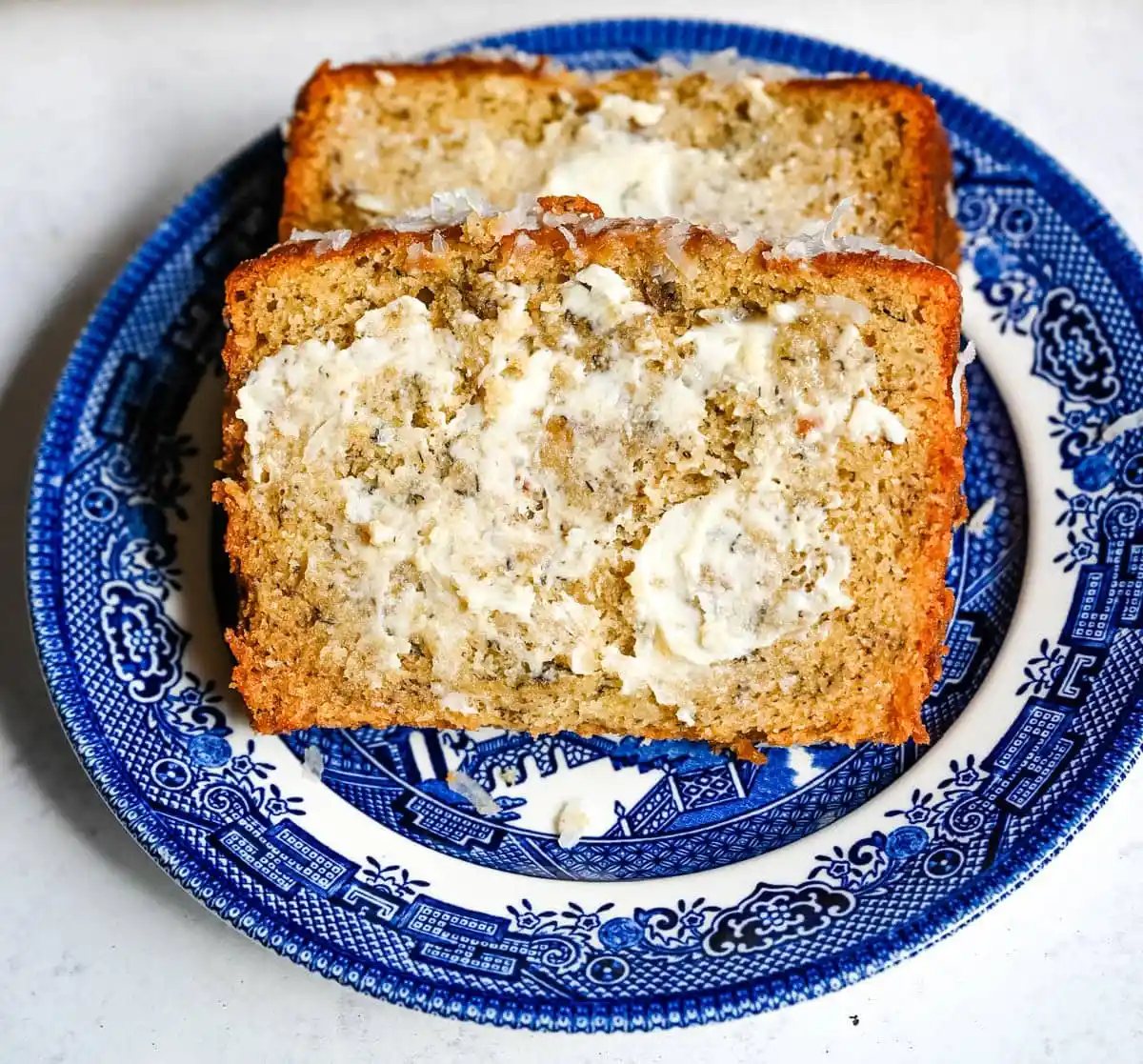 Best Banana Nut Bread Recipe. This is the moistest banana nut bread you'll ever make — a rich, tender loaf made with ripe bananas, sour cream, and your choice of walnuts, pecans, or macadamia nuts. Includes tips for the ultimate moist crumb, a brown sugar topping, and answers to every banana bread question you have.