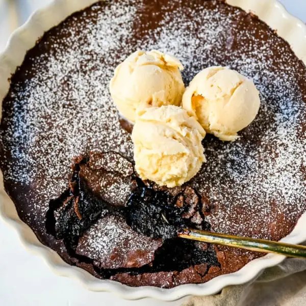 Brownie pudding is the viral, ultra-rich chocolate dessert combining the best parts of brownies and molten lava cake. This easy dessert bakes into a crackly top with a gooey, fudgy, pudding-like center that is chocolate lover's dream dessert. Made famous by Ina Garten, brownie pudding is trending everywhere on TikTok, thanks to its simple ingredients, decadent texture, and rich flavor. You will love Ina Garten's Brownie Pudding recipe!
