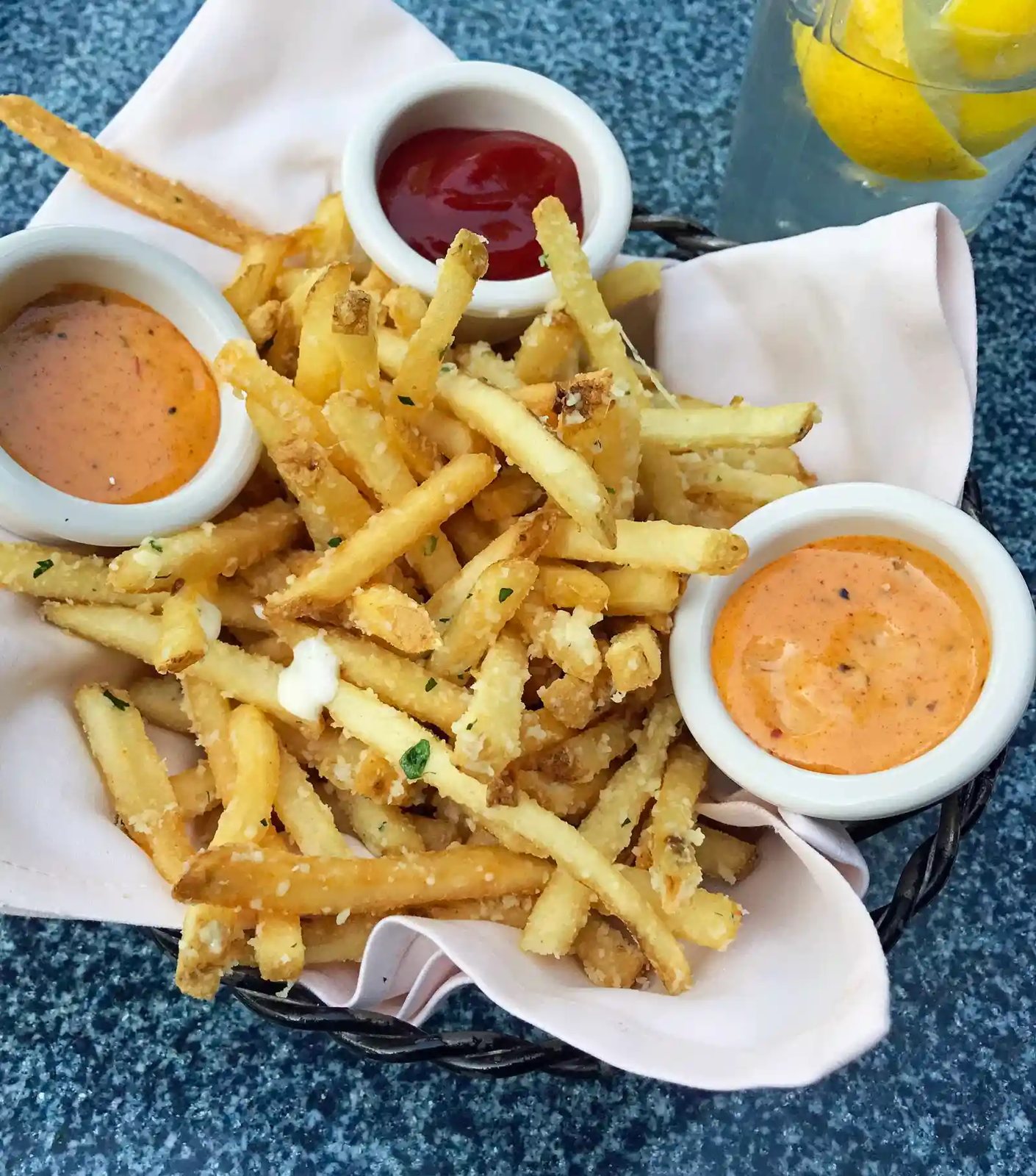 Pommes Frites at Disneyland. The Best Eats and Treats at Disneyland. The best food to eat at Disneyland. A list of the most popular and favorite food at Disneyland parks. A list of what to eat at Disneyland. www.modernhoney.com