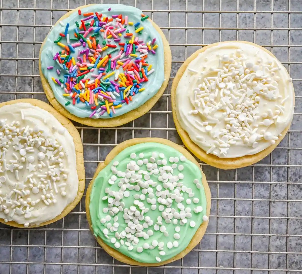 If you are looking for the best soft sugar cookies with frosting, this is the recipe you’ll come back to again and again. These frosted sugar cookies topped with cream cheese frosting bake up perfectly tender and stay soft for days.