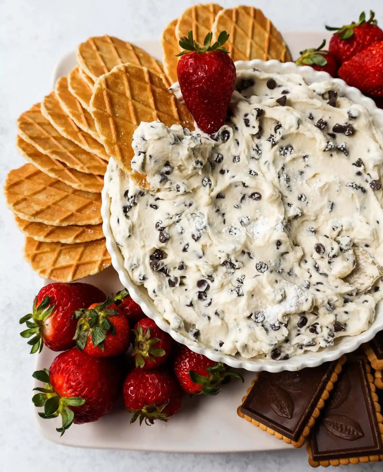 This is the Best Cannoli Dip Recipe made with ricotta cheese, mascarpone or cream cheese, powdered sugar, brown sugar, vanilla, and mini chocolate chips.