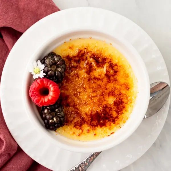 Homemade Creme Brulee Recipe. A creamy, silky vanilla custard topped with crisp sugar crust is one of the most popular desserts at restaurants for good reason. With its silky custard base and crackly caramelized sugar topping, it’s a showstopper that’s surprisingly easy to make at home.