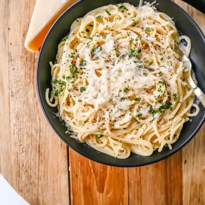 Break-Up Pasta is a creamy 3-Cheese Spaghetti Recipe made with butter, garlic, cream, broth, Italian cheeses, spices, and tossed in spaghetti. It is the best creamy spaghetti recipe known to help cure breakups!