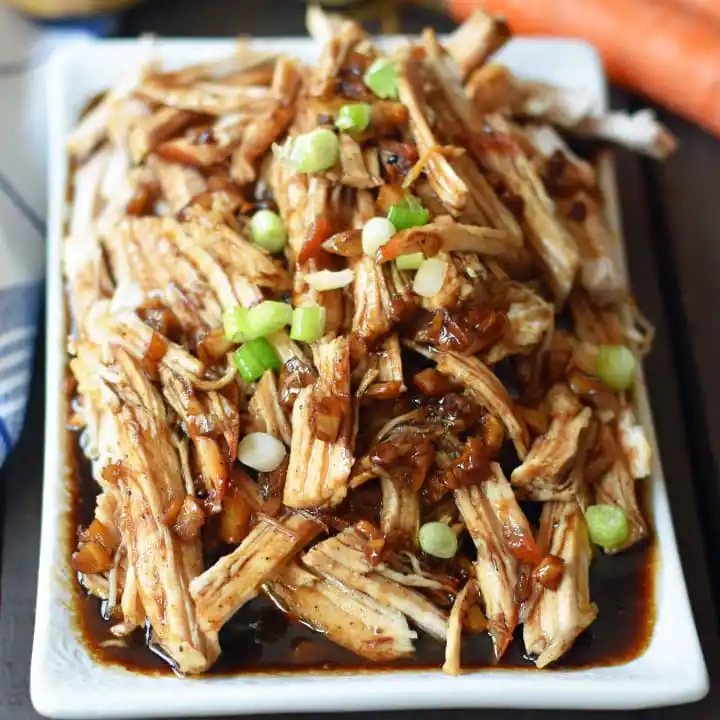 Brown Sugar Balsamic Pork. Tender lean pork loin slow cooked in a brown sugar garlic balsamic glaze. An easy flavorful meal made in a slow cooker or instant pot. www.modernhoney.com
