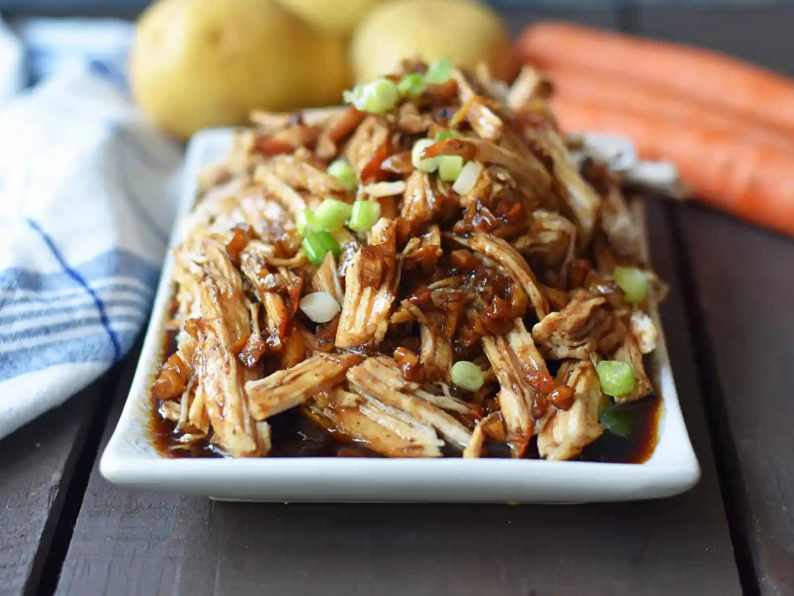 Brown Sugar Balsamic Pork. Tender lean pork loin slow cooked in a brown sugar garlic balsamic glaze. An easy flavorful meal made in a slow cooker or instant pot. www.modernhoney.com