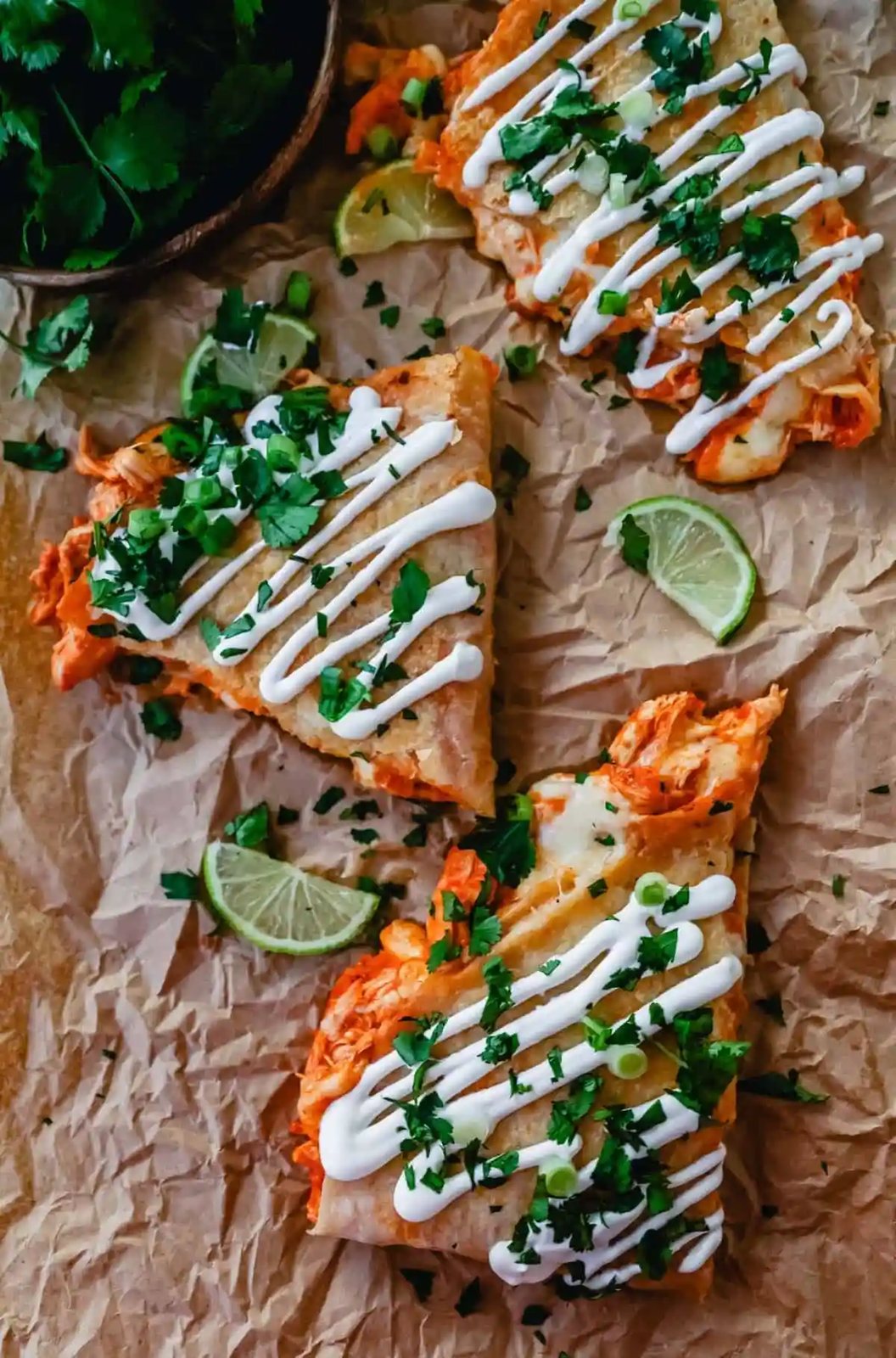 Buffalo Chicken Quesadilla is made with a hot wing buffalo ranch chicken and melted jack cheese in a buttery tortilla and cooked until golden brown.