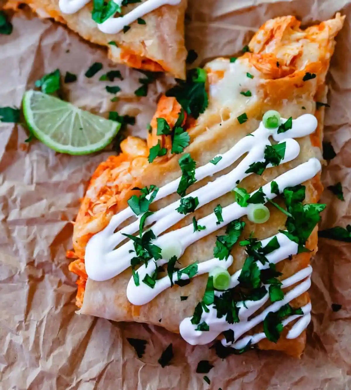 Buffalo Chicken Quesadilla is made with a hot wing buffalo ranch chicken and melted jack cheese in a buttery tortilla and cooked until golden brown.