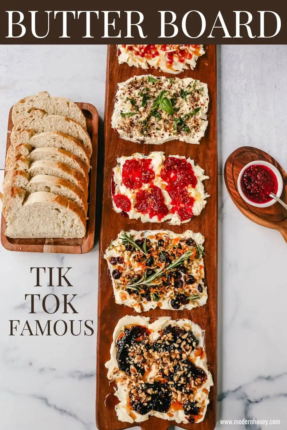 A Butter Board with fresh butter is spread onto a board and topped with an assortment of toppings and served with warm bread. This Butter Board with Toppings is such a fun appetizer for a party!