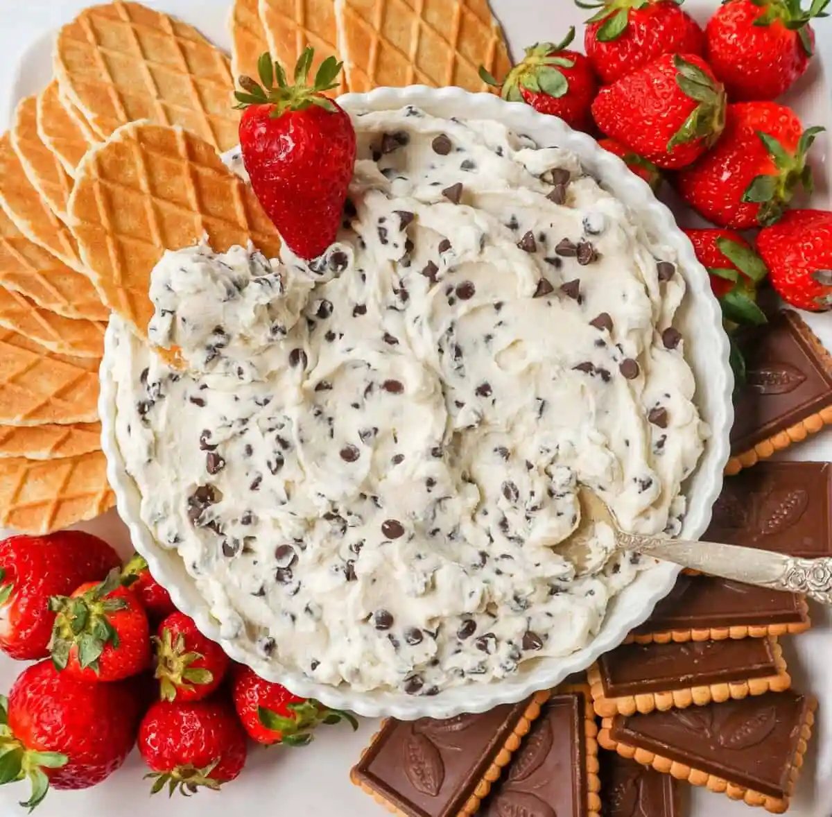 This is the Best Cannoli Dip Recipe made with ricotta cheese, mascarpone or cream cheese, powdered sugar, brown sugar, vanilla, and mini chocolate chips.