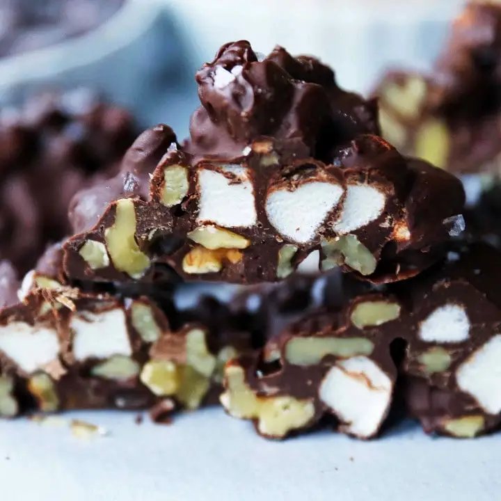 Rocky Road Candy Clusters. Easy no-bake 5-ingredients rocky road clusters made with chocolate, butterscotch, walnuts, and marshmallows. Microwave 5-ingredient Christmas candy recipe. www.modernhoney.com #chocolate #microwavecandy #5ingredients #christmascandy #rockyroad #rockyroadcandy #rockyroadclusters #chocolatemarshmallow