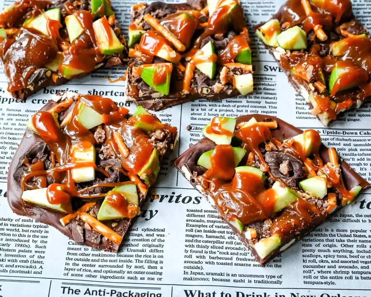 This Caramel Apple Bark is an easy no-bake Fall treat and made with fresh apples, buttery caramel, crunchy pretzels, and rich chocolate. This quick and easy Fall dessert is absolutely delicious and a crowd favorite!