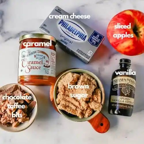 A 5-ingredient Caramel Apple Dip made with cream cheese, brown sugar, vanilla, caramel sauce, and Heath Bar toffee pieces. This is the perfect dip for fresh apples! This Caramel Toffee Dip is the easiest dessert to serve at parties.