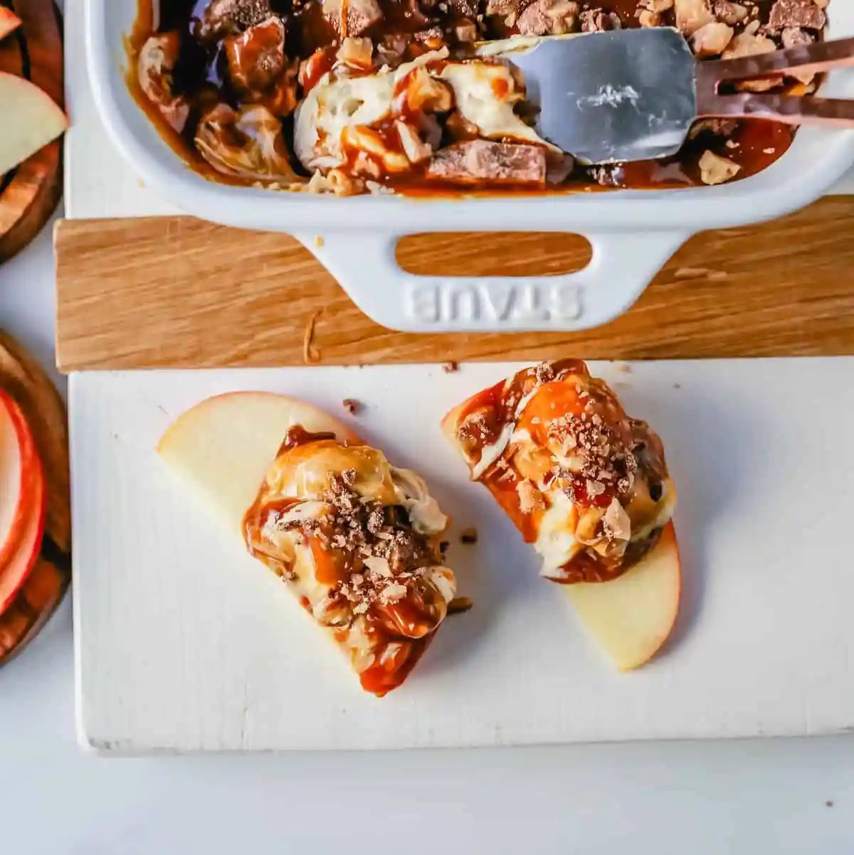 A 5-ingredient Caramel Apple Dip made with cream cheese, brown sugar, vanilla, caramel sauce, and Heath Bar toffee pieces. This is the perfect dip for fresh apples! This Caramel Toffee Dip is the easiest dessert to serve at parties.