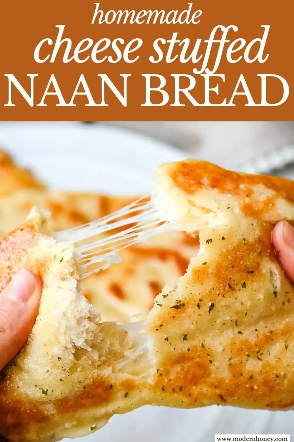 Homemade Cheesy Naan bread stuffed with mozzarella cheese, that is even better than what you find in restaurants. Cheese-stuffed naan is soft, slightly chewy, golden-brown on the outside, fluffy bread layers inside, and melty gooey cheese in the center.