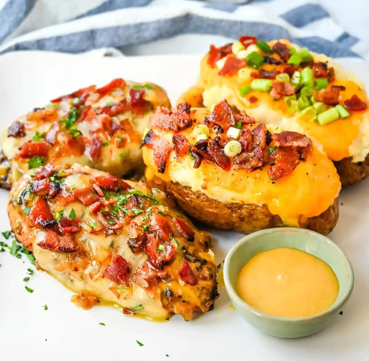 Cheesy Bacon Smothered Chicken. This juicy, marinated grilled chicken breast is smothered with honey mustard sauce, melted cheese, and crispy bacon. To make it extra flavorful, add caramelized onions or mushrooms. You may know this as the famous Alice Springs Chicken from Outback Steakhouse but you can make it at home.