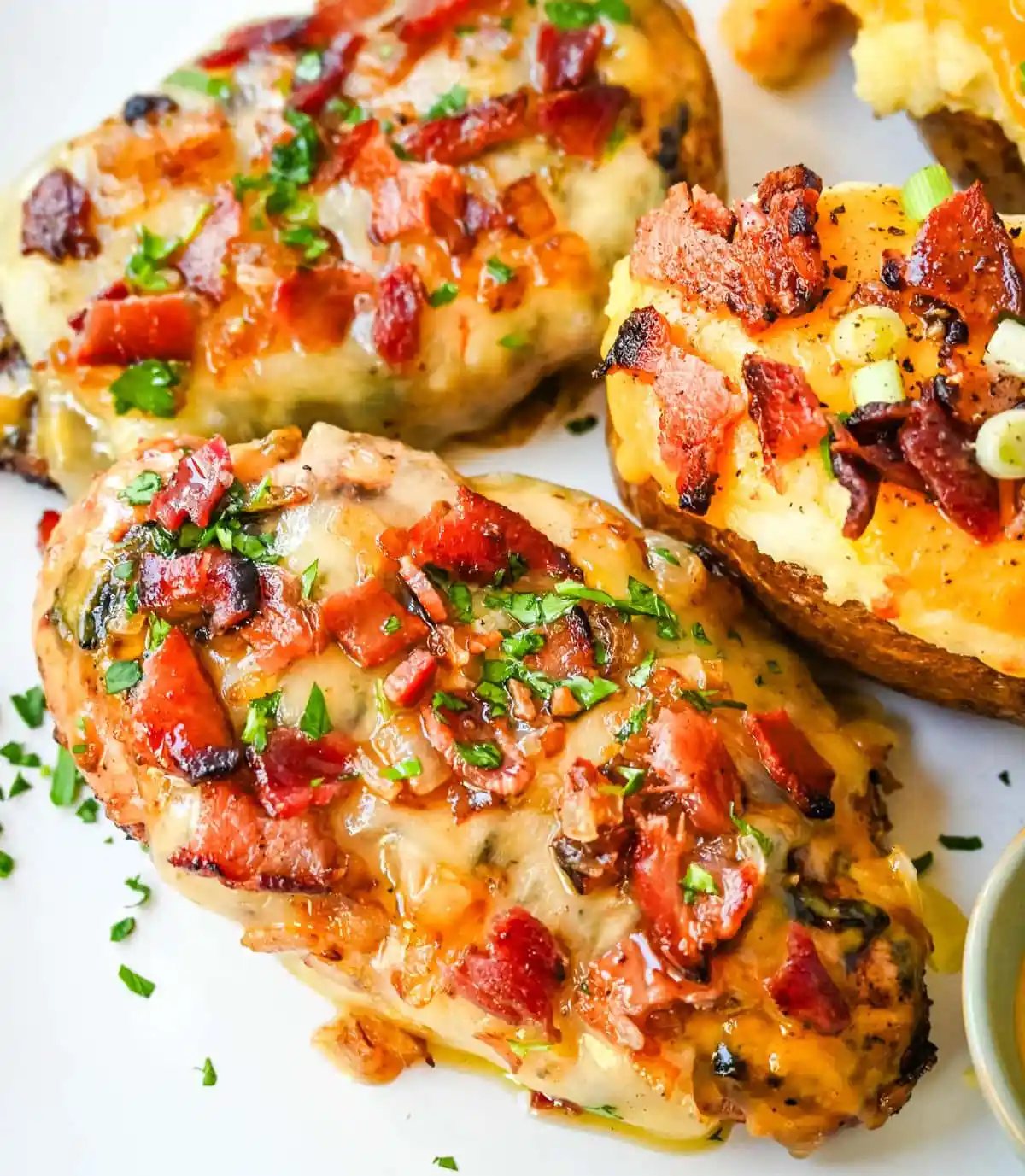 Cheesy Bacon Smothered Chicken. This juicy, marinated grilled chicken breast is smothered with honey mustard sauce, melted cheese, and crispy bacon. To make it extra flavorful, add caramelized onions or mushrooms. You may know this as the famous Alice Springs Chicken from Outback Steakhouse but you can make it at home.