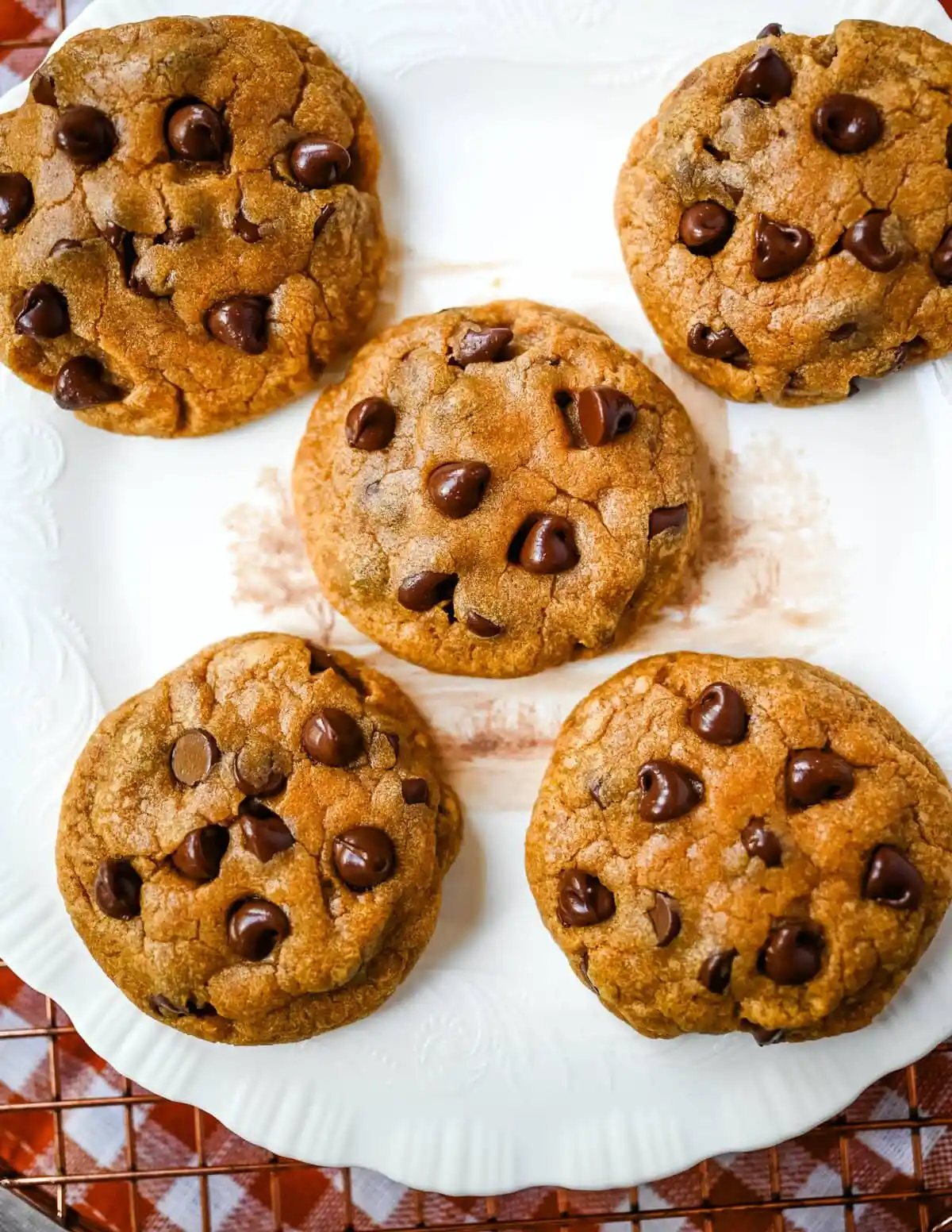This Brown Butter Pumpkin Chocolate Chip Cookie Recipe combines warm spices, pumpkin, and rich brown butter flavor to create the perfect Fall cookie. This is the best soft and chewy pumpkin cookie!