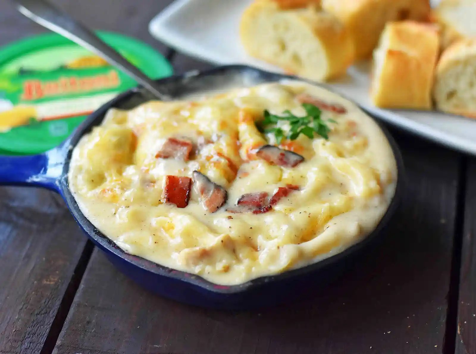 Chicken Bacon Alfredo Dip with Sautéed Chicken, Buitoni Alfredo Sauce, Crispy Bacon and baked with Mozzarella and Buitoni Parmesan Cheese. Served with sliced French Bread. A savory and cheese-filled baked appetizer that will please the masses!
