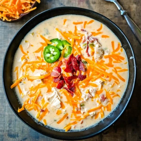 This creamy chicken jalapeño popper soup is everything you love about jalapeño poppers in a cozy bowl. Loaded with bacon, shredded chicken, cream cheese, and cheddar, it’s the ultimate comfort food with a spicy kick. The best jalapeño popper soup!