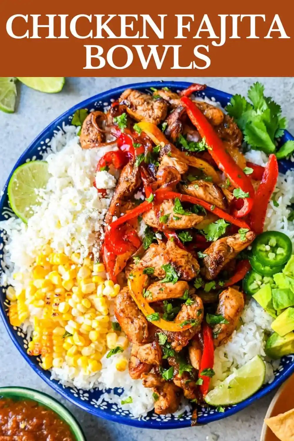 Chicken Fajita Bowl. Juicy, flavorful chicken fajitas in a bowl with rice, beans, charred corn, guacamole, salsa, and fresh cilantro. The flavors of chicken fajitas without the tortillas!
