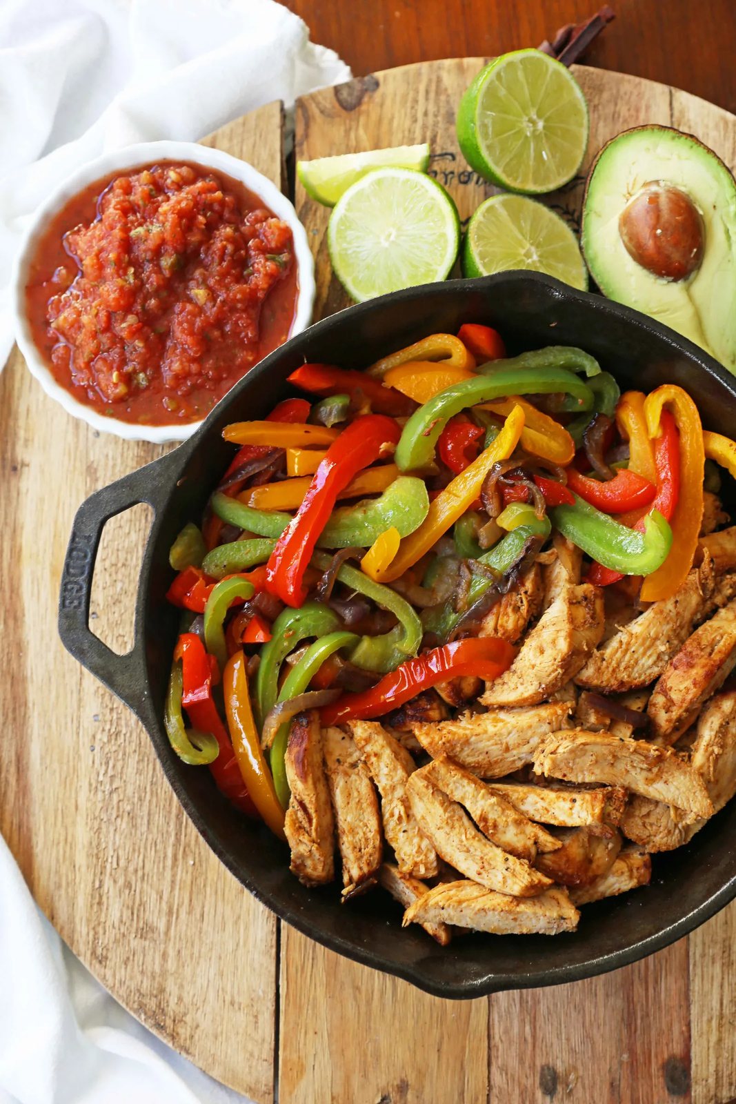The Best Chicken Fajitas Recipe. Flavorful, juicy, seasoned chicken fajitas with sauteed onions and peppers. The perfect chicken fajitas recipe! www.modernhoney.com #chicken #chickenfajitas #fajitas #mexican #mexicanfood