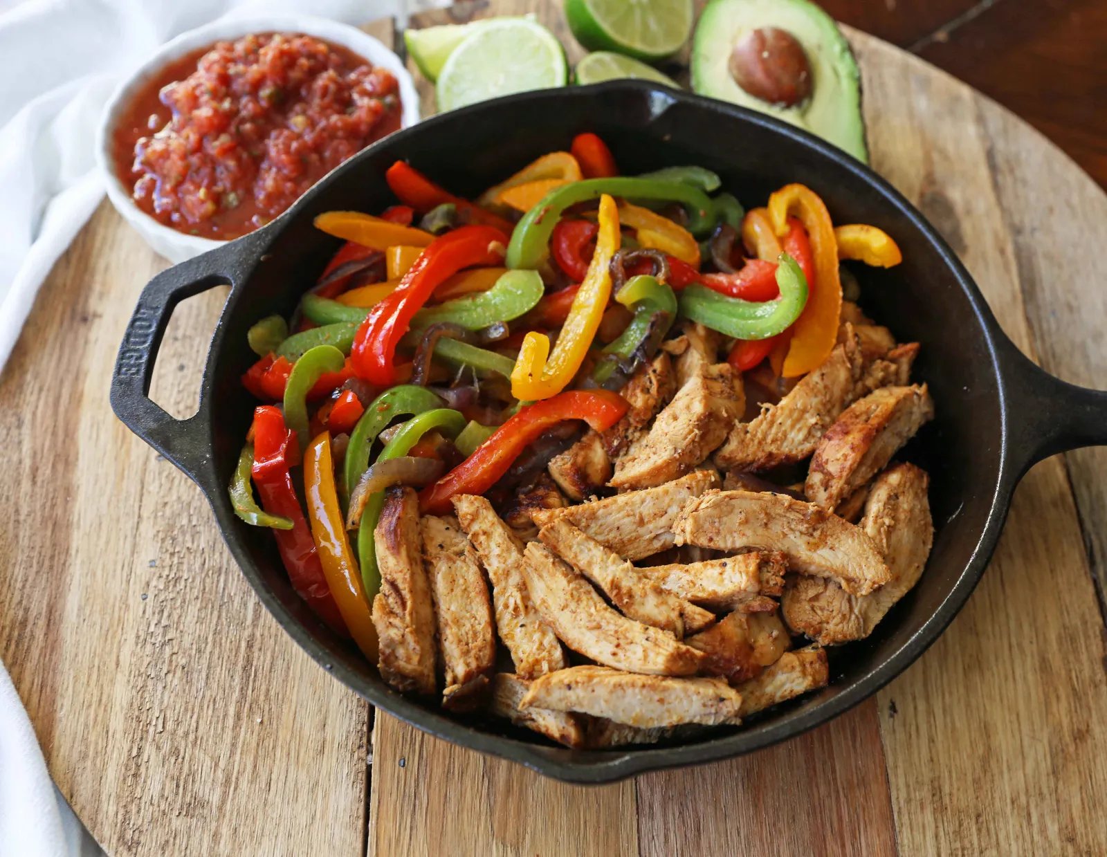 The Best Chicken Fajitas Recipe. Flavorful, juicy, seasoned chicken fajitas with sauteed onions and peppers. The perfect chicken fajitas recipe! www.modernhoney.com #chicken #chickenfajitas #fajitas #mexican #mexicanfood