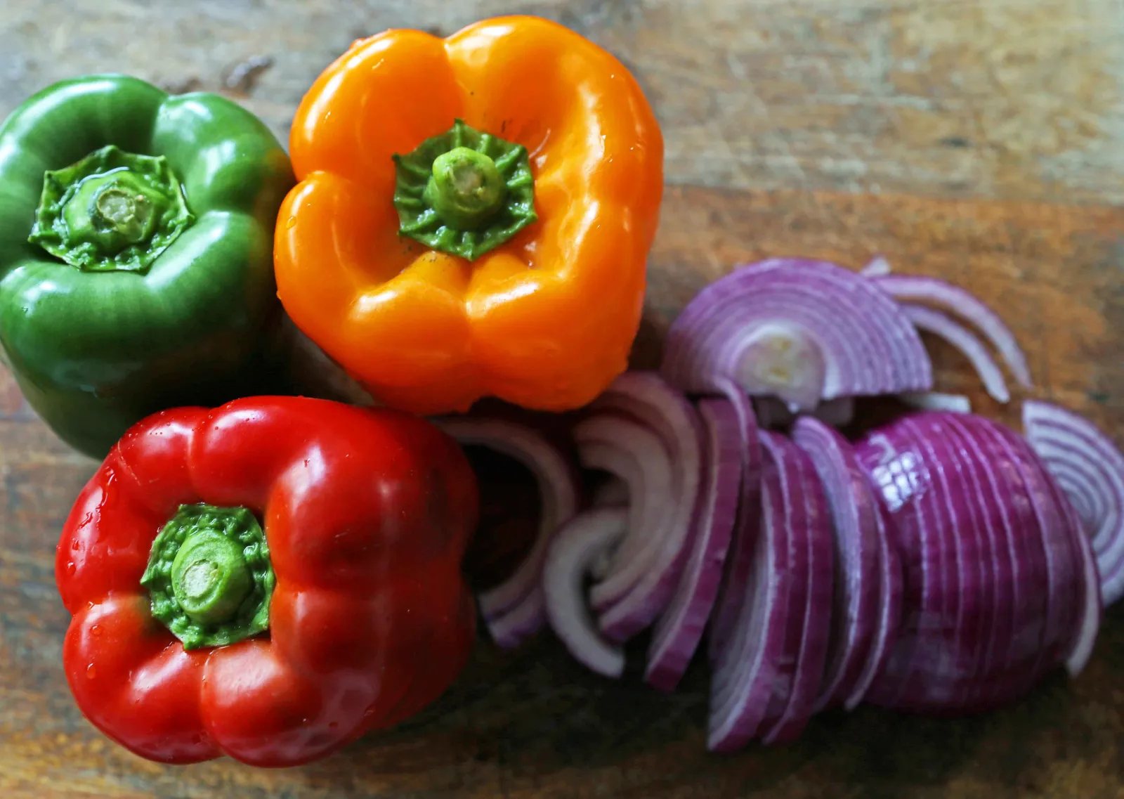 Peppers and Onions for Chicken Fajitas. The Best Chicken Fajitas Recipe. Flavorful, juicy, seasoned chicken fajitas with sauteed onions and peppers. The perfect chicken fajitas recipe! www.modernhoney.com #chicken #chickenfajitas #fajitas #mexican #mexicanfood