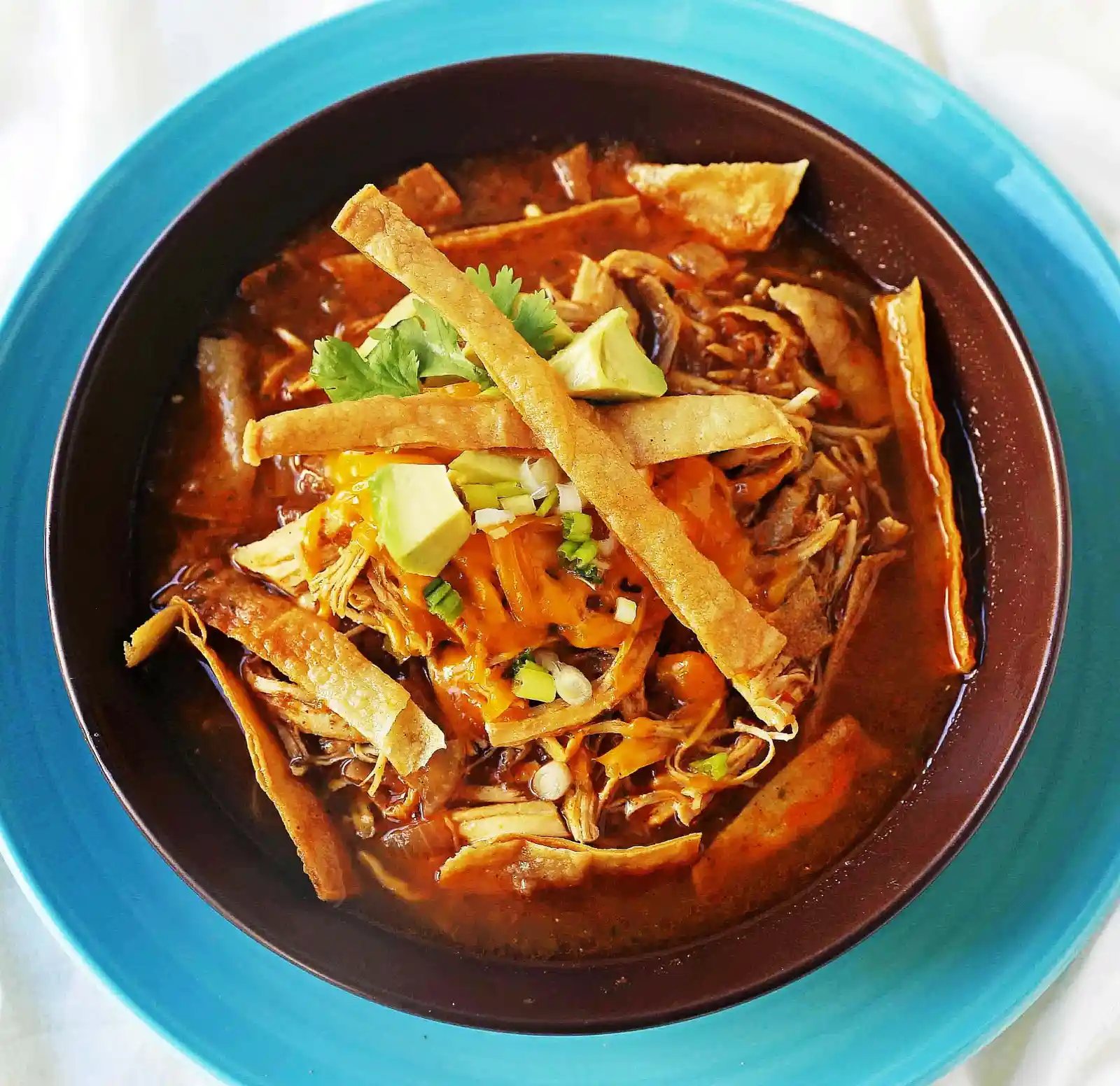 Chicken Tortilla Soup. The Best Homemade Chicken Tortilla Soup Recipe. Flavorful, easy chicken soup recipe. www.modernhoney.com #chickentortillasoup #tortillasoup #chickentortillasouprecipe