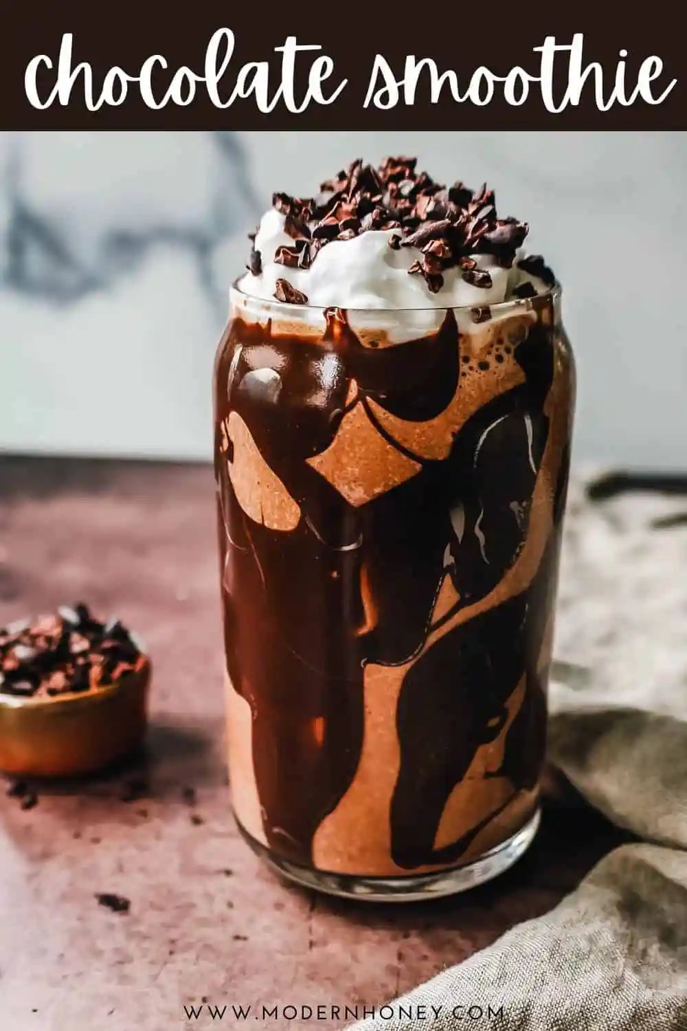 This Chocolate Almond Butter Smoothie is the richest, creamiest healthy chocolate protein shake made with almond butter. This tastes like a chocolate milkshake and you will forget you are drinking a chocolate protein shake!