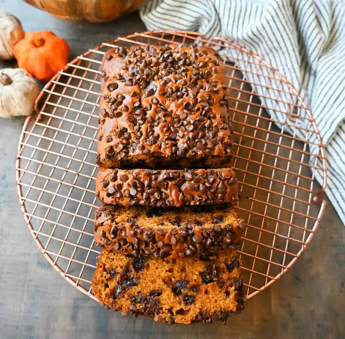 How to make the best pumpkin chocolate chip bread ever! This moist pumpkin spiced bread with chocolate chips will be a Fall favorite. It is the most perfect chocolate chip pumpkin bread.
