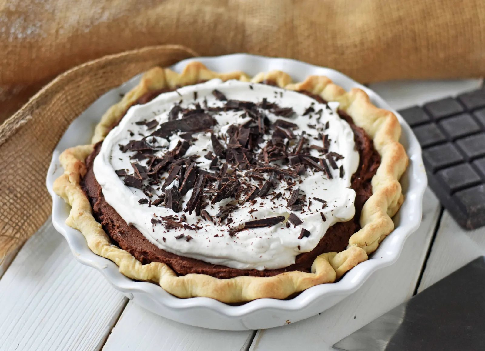 Chocolate Cream Pie. A homemade rich chocolate silk pie with a homemade chocolate custard. The best chocolate cream pie. www.modernhoney.com #chocolatecreampie #chocolatepie #pie #pierecipes #chocolate
