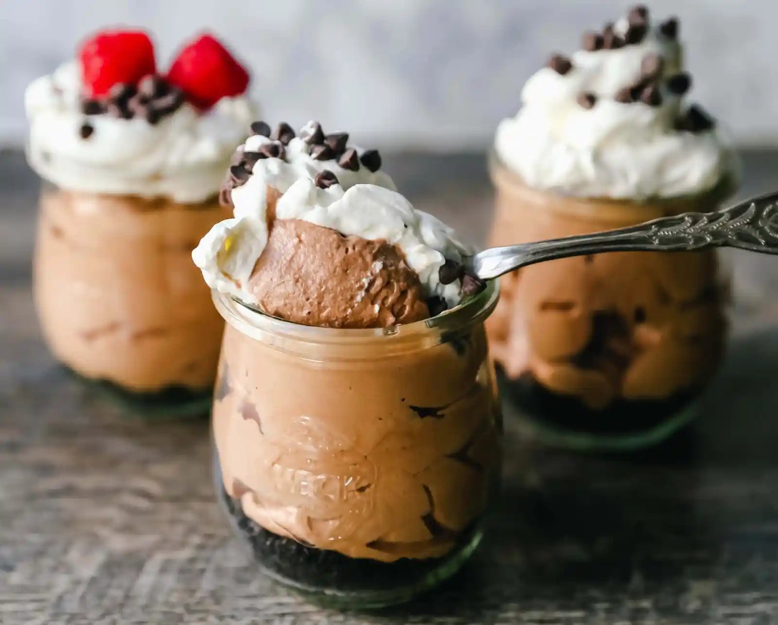 Chocolate Nutella Cheesecake Mousse No-Bake 5-Minute Chocolate Nutella Mousse made with only four ingredients -- Nutella, cream cheese, heavy cream, and powdered sugar. www.modernhoney.com #mousse #chocolatemousse #dessert