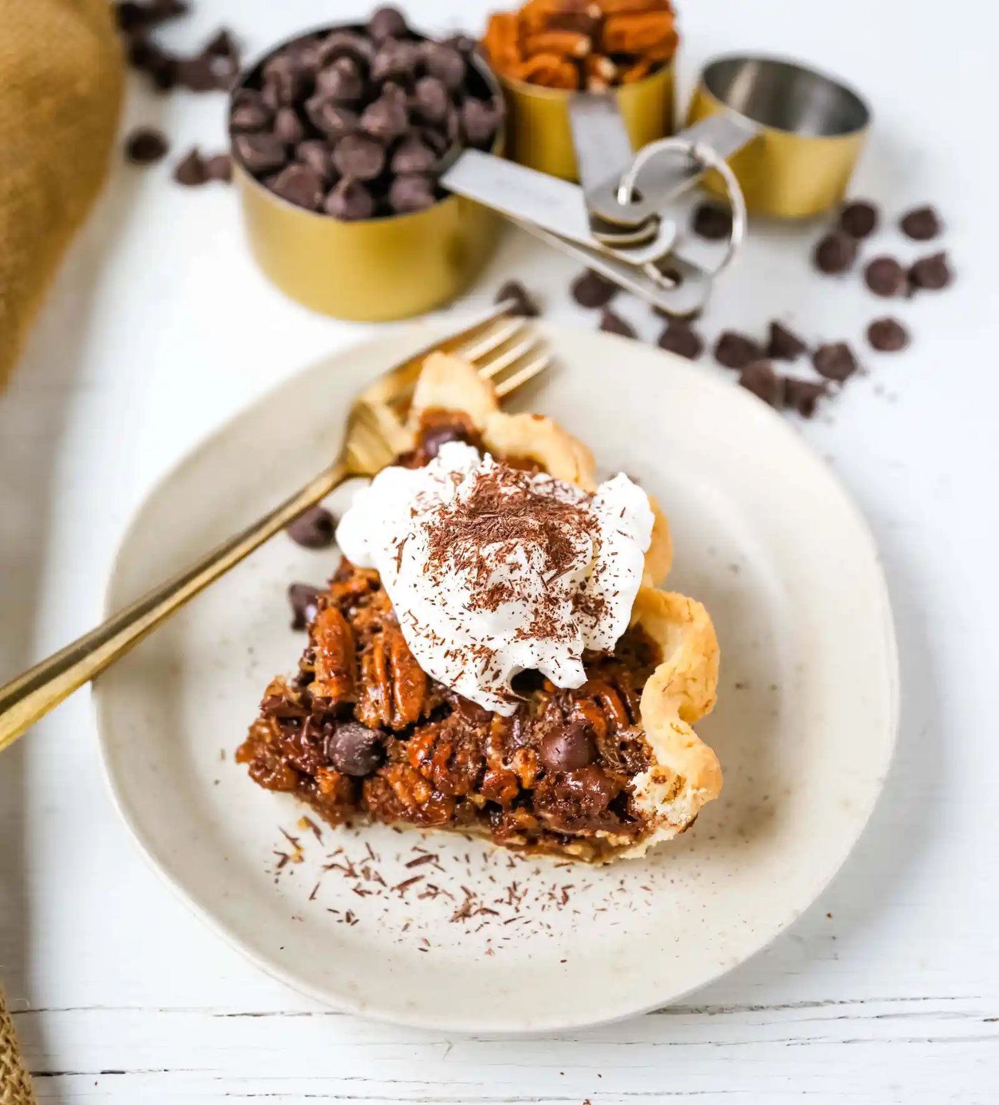 Chocolate Pecan Pie Rich chocolate pecan pie made with a brown sugar filling, crunchy pecans, rich chocolate, all in a homemade buttery, flaky pie crust. www.modernhoney.com #pie #pecanpie #chocolatepecanpie #thanksgiving #pies