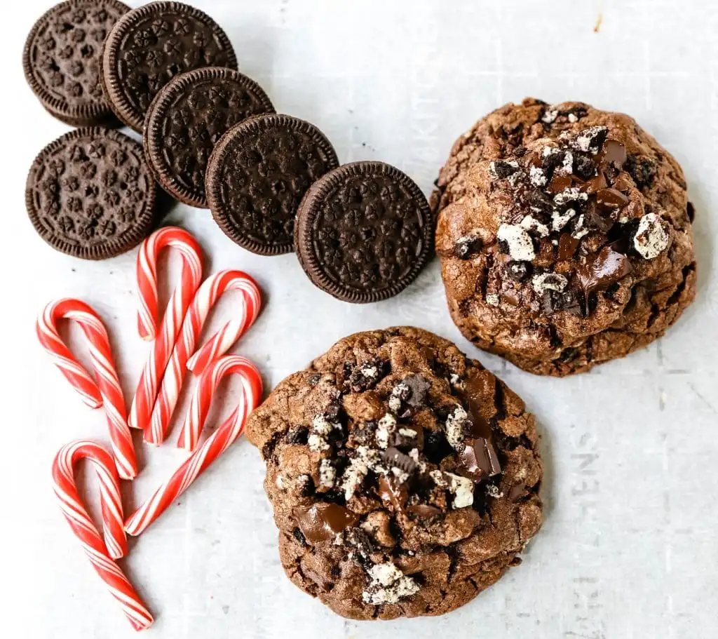 Chocolate Peppermint Candy Cane Oreo Cookies. The best chocolate peppermint cookies. Double chocolate cookies with Trader Joe's famous candy cane Joe Joe's Oreo cookies. www.modernhoney.com #chocolatecookies #chocolatepeppermint #chocolatemint #christmas #christmascookies #candycanes