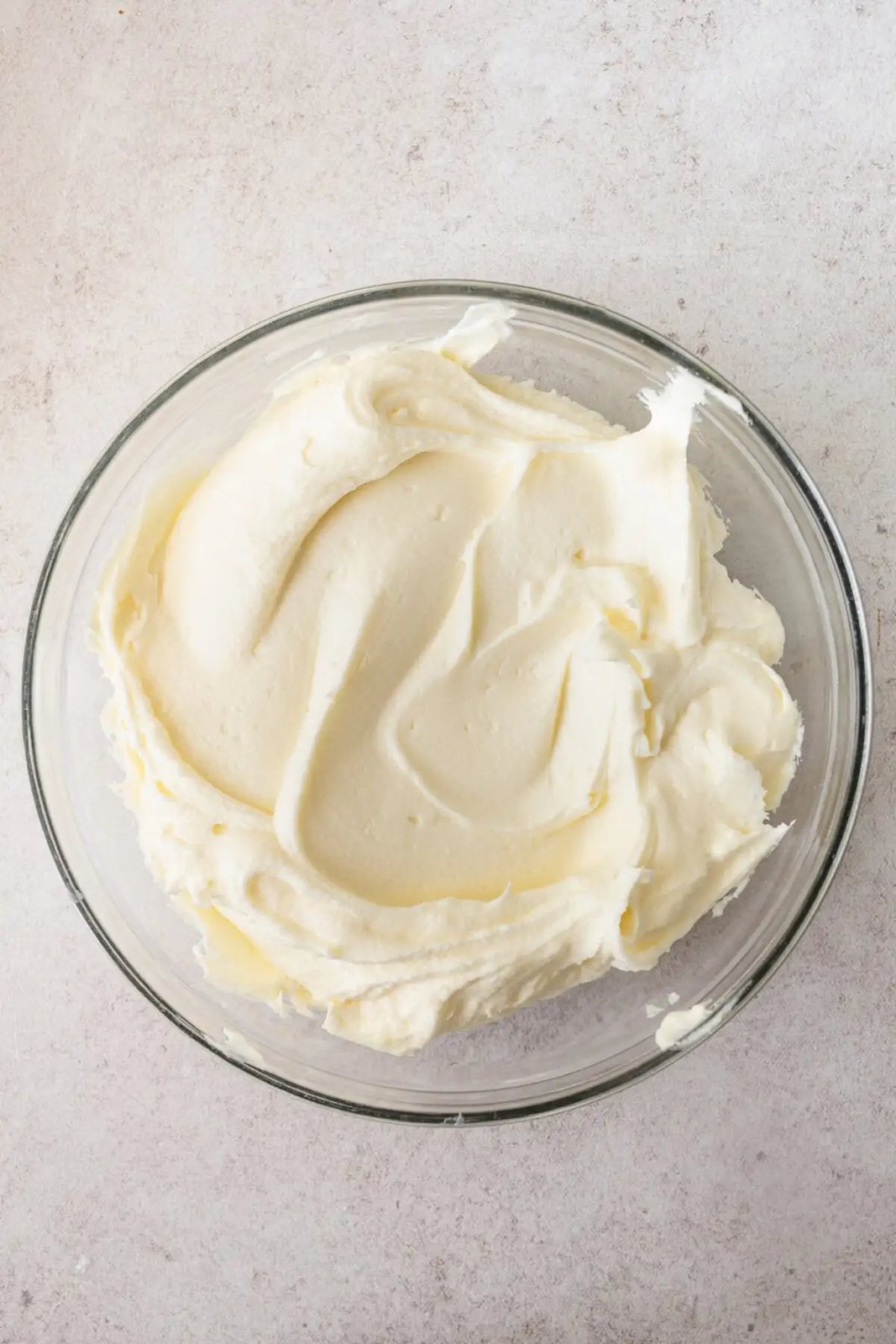 Coconut Cream Cheese Frosting to spread on a homemade coconut cake.