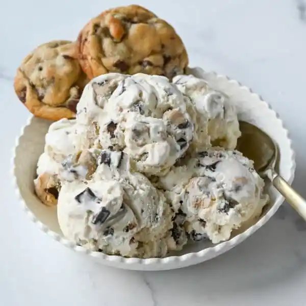 How to make creamy chocolate chip cookie dough at home. It is so easy to make edible chocolate chip cookie dough perfectly paired with vanilla bean ice cream. The easiest and best homemade chocolate chip cookie dough ice cream recipe!